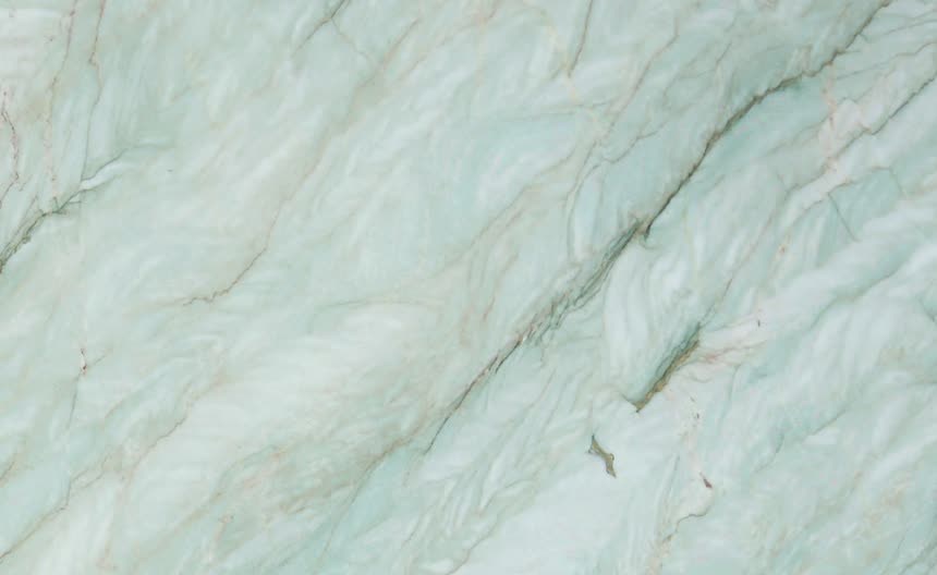 Gaya Quartzite — close view of the stone surface. Green-grey structure broken by pale crystalline seams.